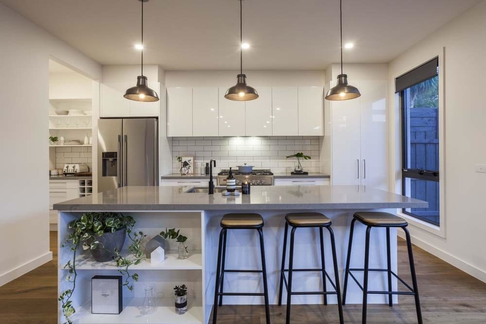 Kitchen With Stone Benchtop and Hanging Lights — Stone Benchtops In Dubbo, NSW
