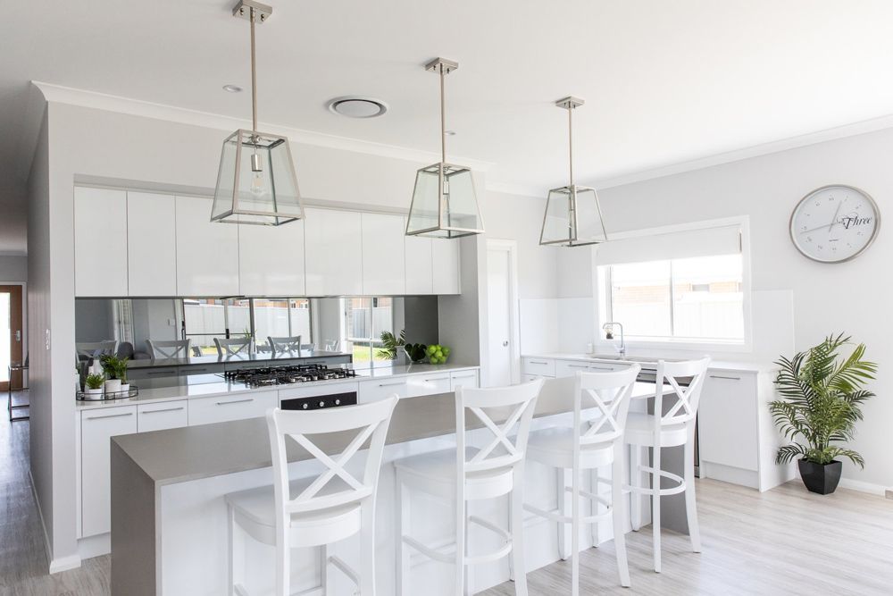 Countertop With Bar Stool — Kitchen Renovations in Dubbo, QLD