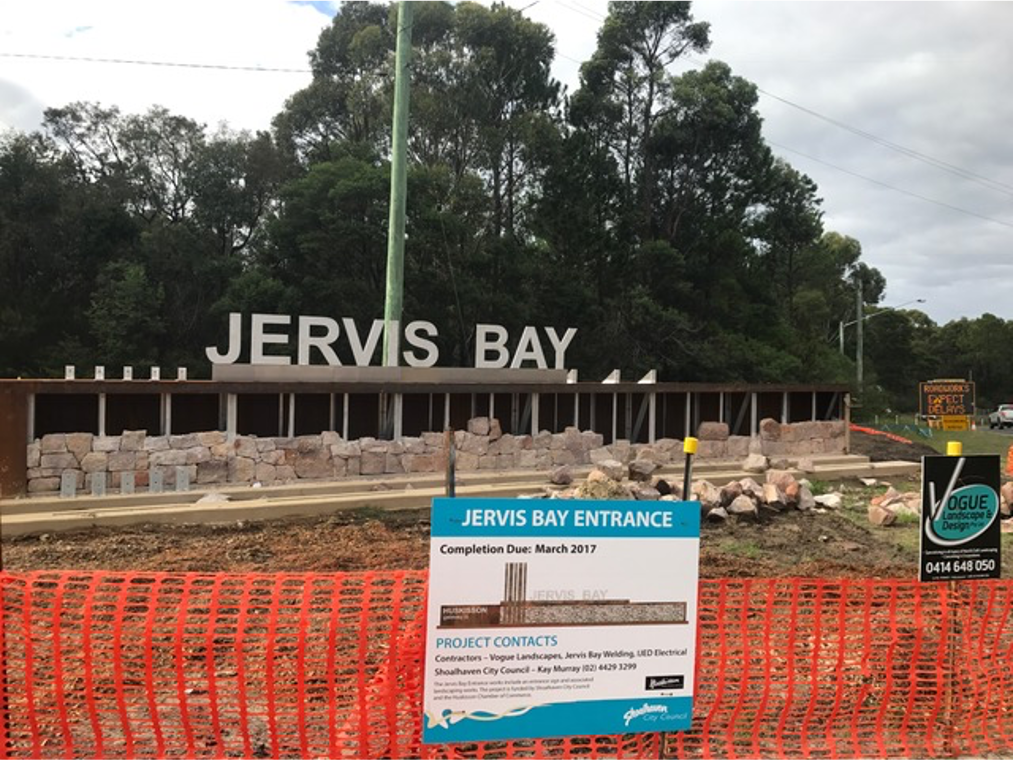 A construction site with a sign that says jervis bay