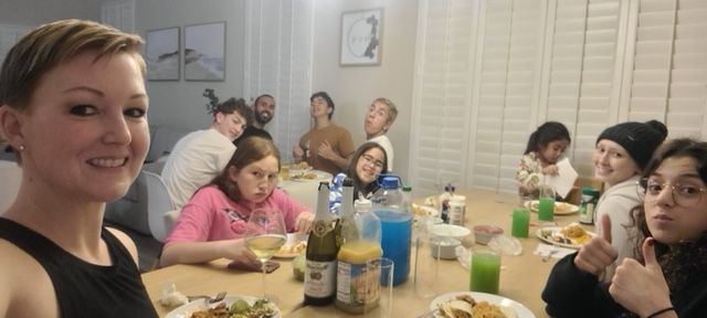 Jocelyn and her family celebrate Christmas dinner, thanks to the Ryan Gordy Foundation's Guardian Angel Program