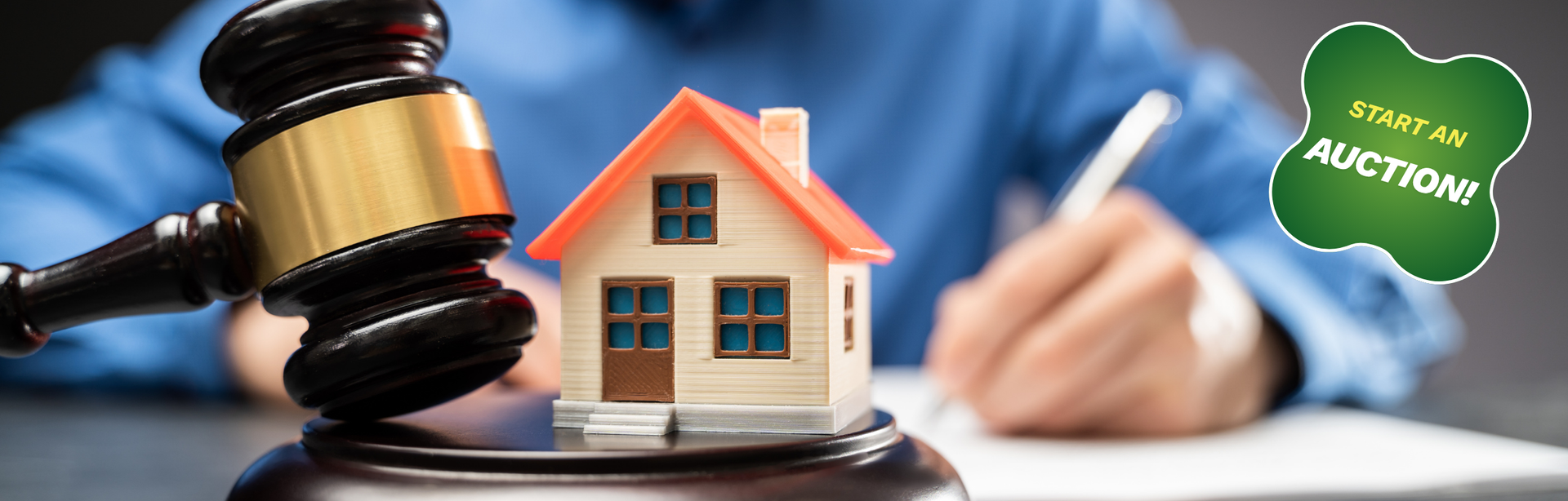 Start Your Auction! A gavel next to a miniature house with a person signing documents, symbolizing a real estate auction.
