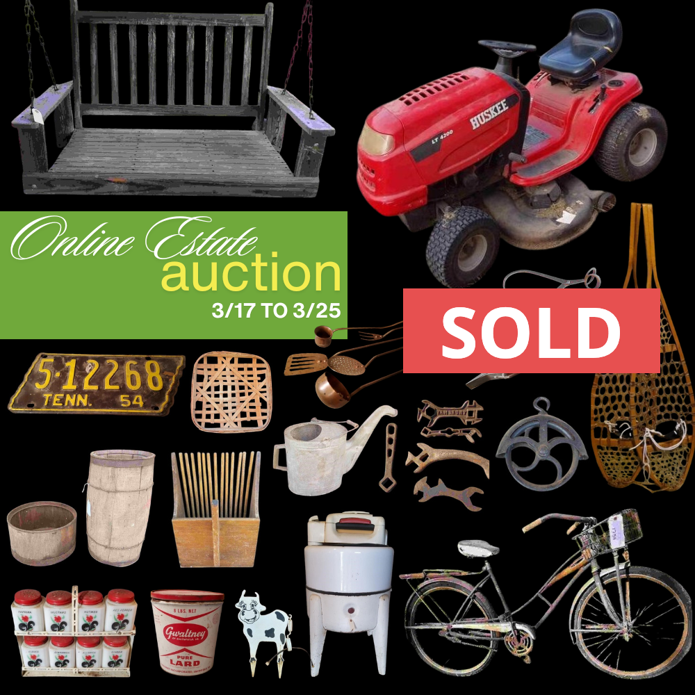 A picture of a lawn mower with a sold sign - Sold & closed by Collins & Co. 