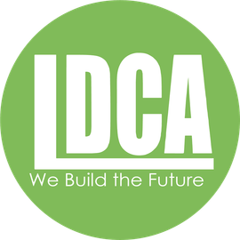 LDCA logo in white on a green circle with the tagline “We Build the Future”