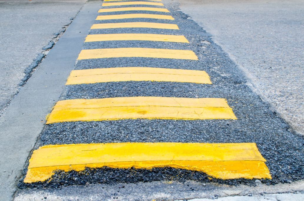 Yellow Stripe Speed Ramp On An Asphalt Road — Potholes ‘R’ Us In Toowoomba, QLD
