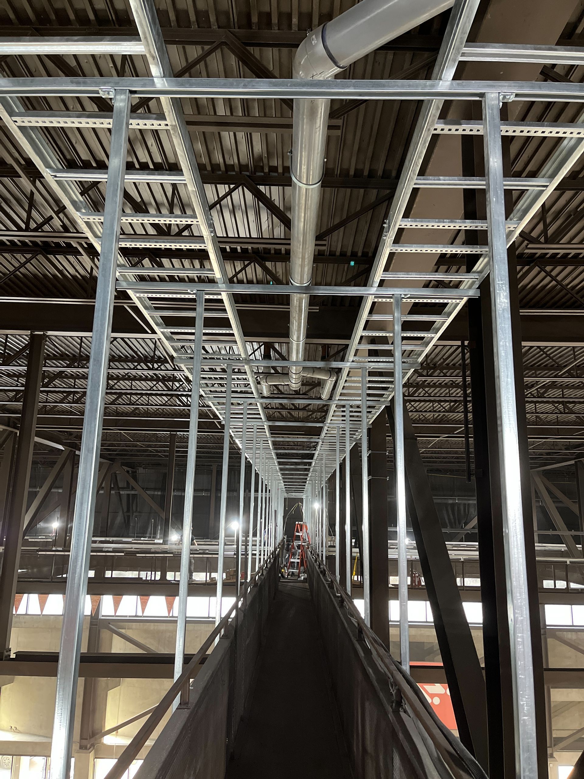 A bridge is being built in the middle of a building.