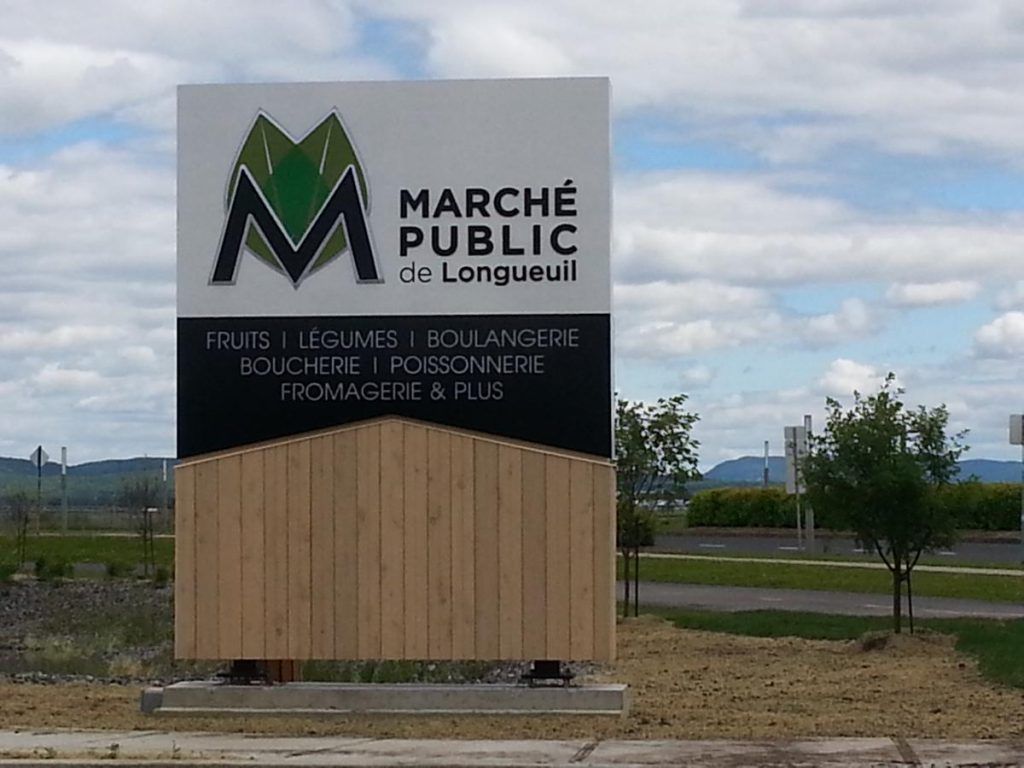 A sign that says marche public de longueuil on it