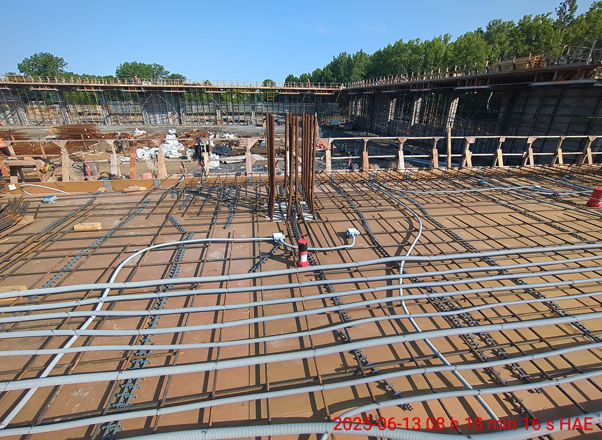 A construction site with a lot of wires going through it