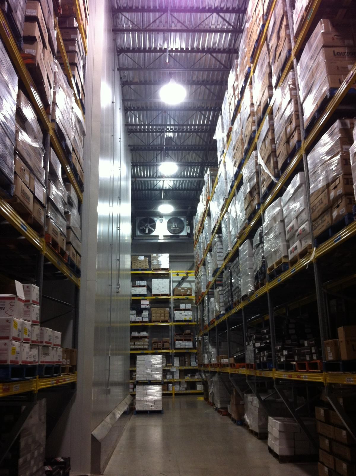 A warehouse filled with lots of shelves and boxes