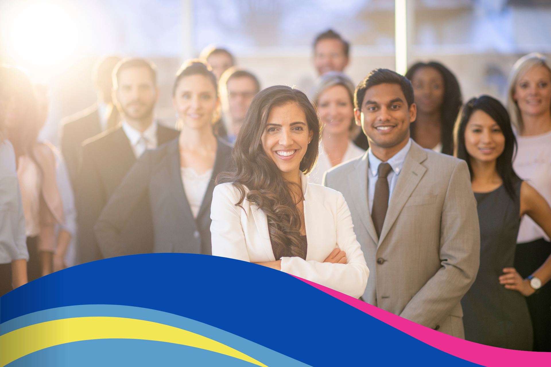 A group of business people are posing for a picture together.