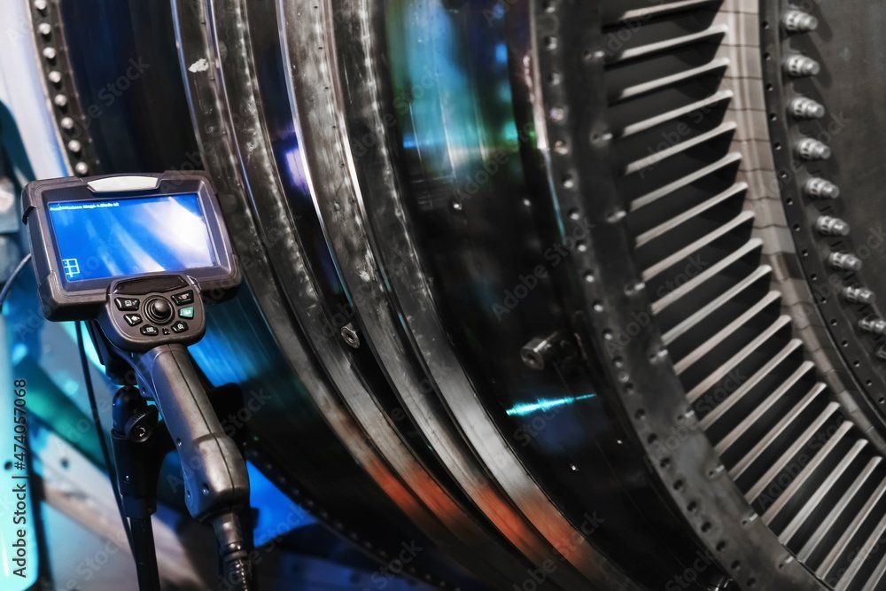 A close-up of a turbine with a camera attached to it.