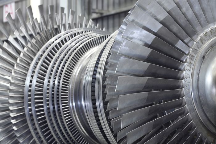 A close up of a turbine with a lot of blades