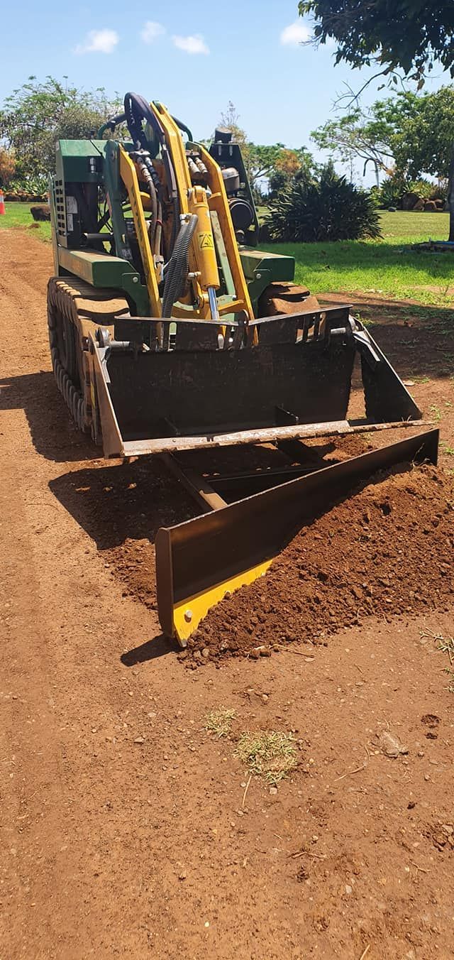 A John Deere Skid Steer Grading a Dirt Path — All Access Mini Earthworks in Gin Gin, QLD