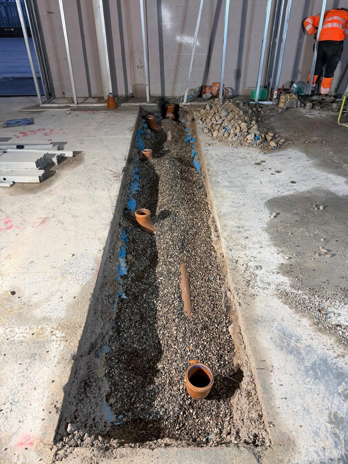 Carter Civils drainage installation with pipework and excavation on a UK construction site