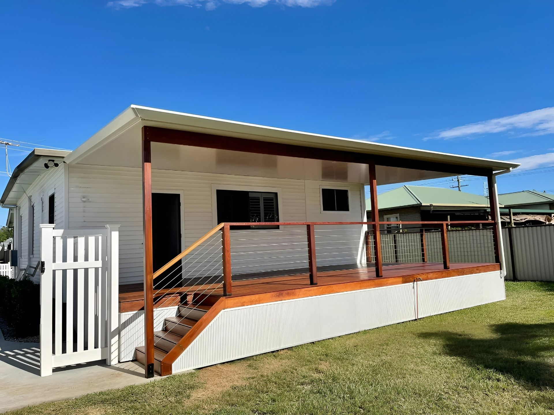Small Beige House with A Covered Porch and Wooden Steps — WJG Built in Wollongbar, NSW