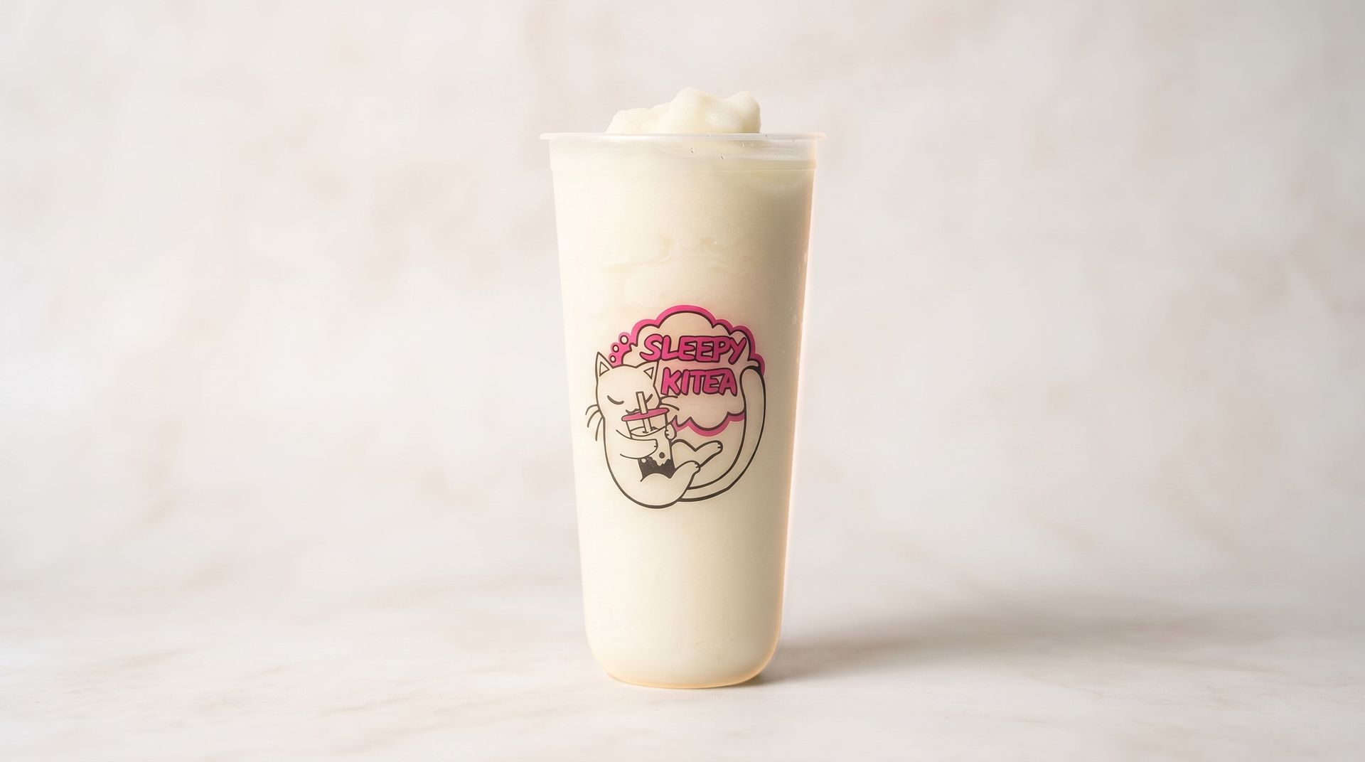 Tall white frosted drink cup with a pink logo on a plain light background