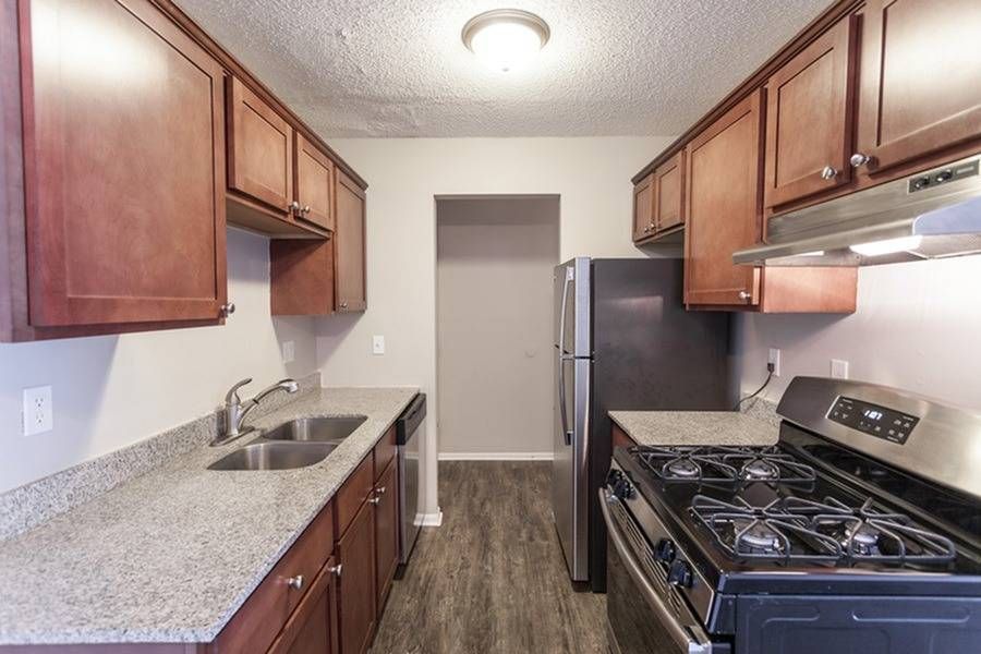 Kitchen with brown cabinets.