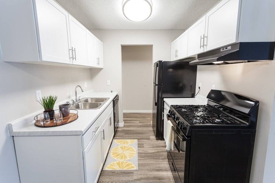 Kitchen with white cabinets.
