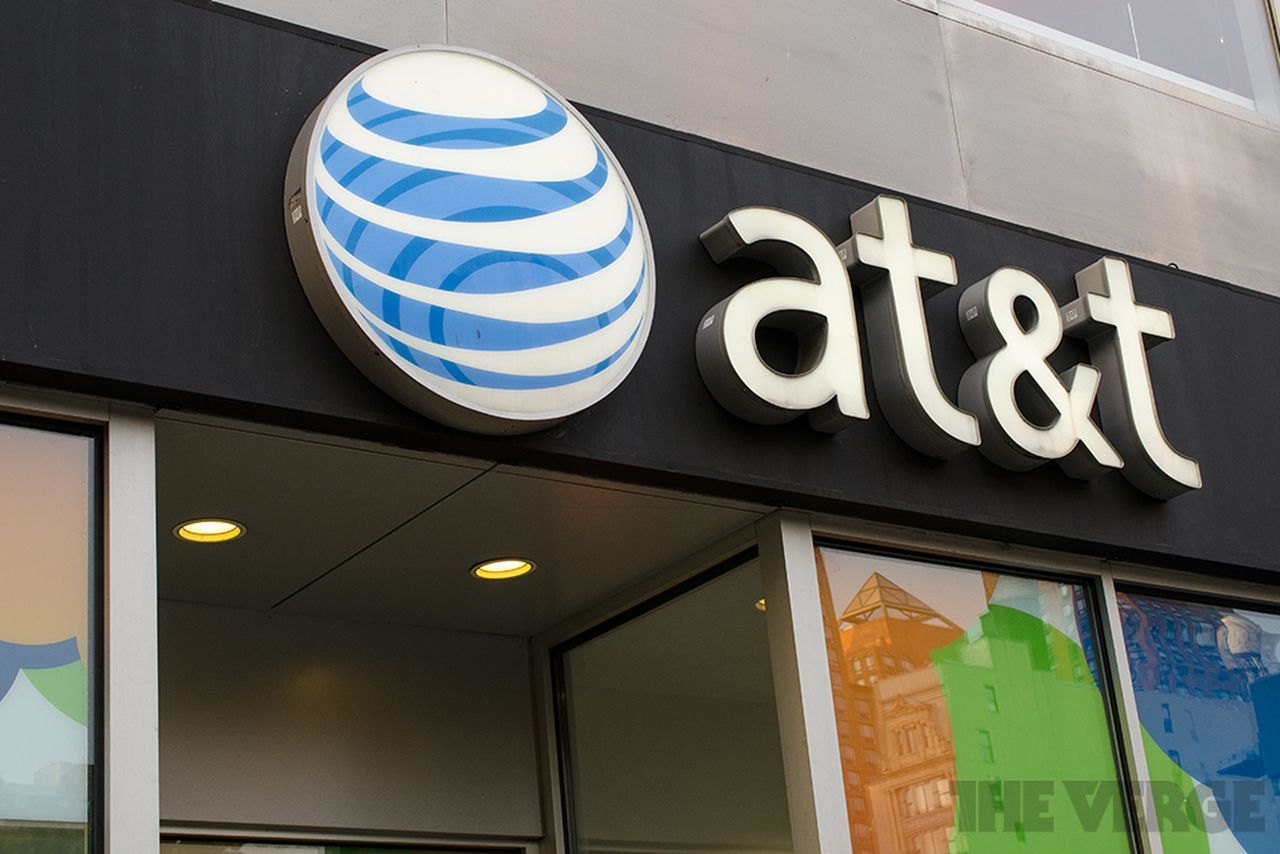 An at & t store front with a blue and white logo