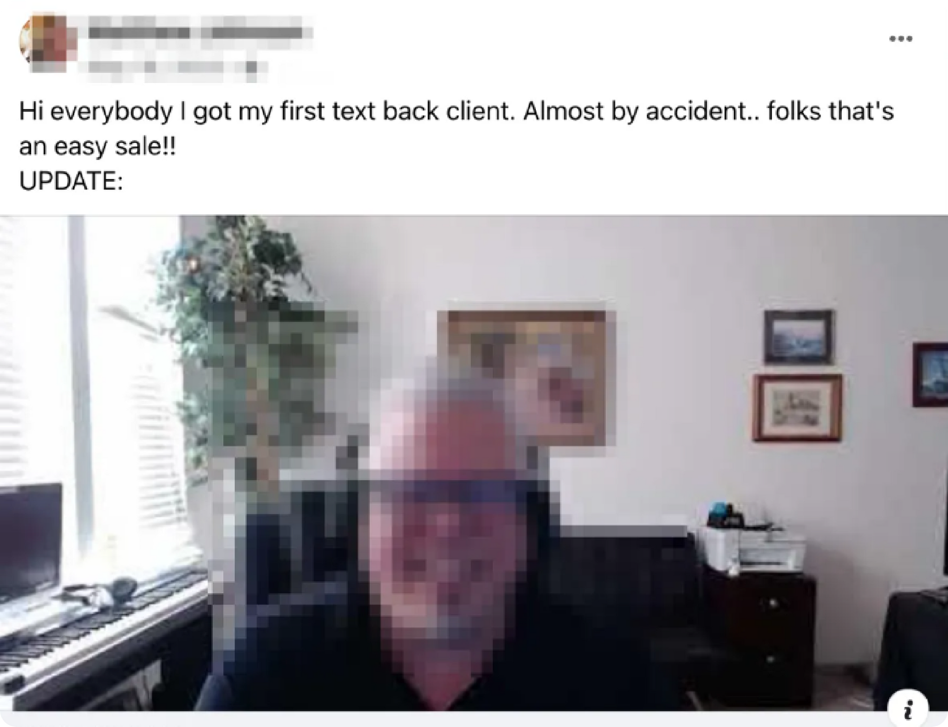 Person on webcam in a room with a piano, plant, and framed wall art; text says first black client, update.
