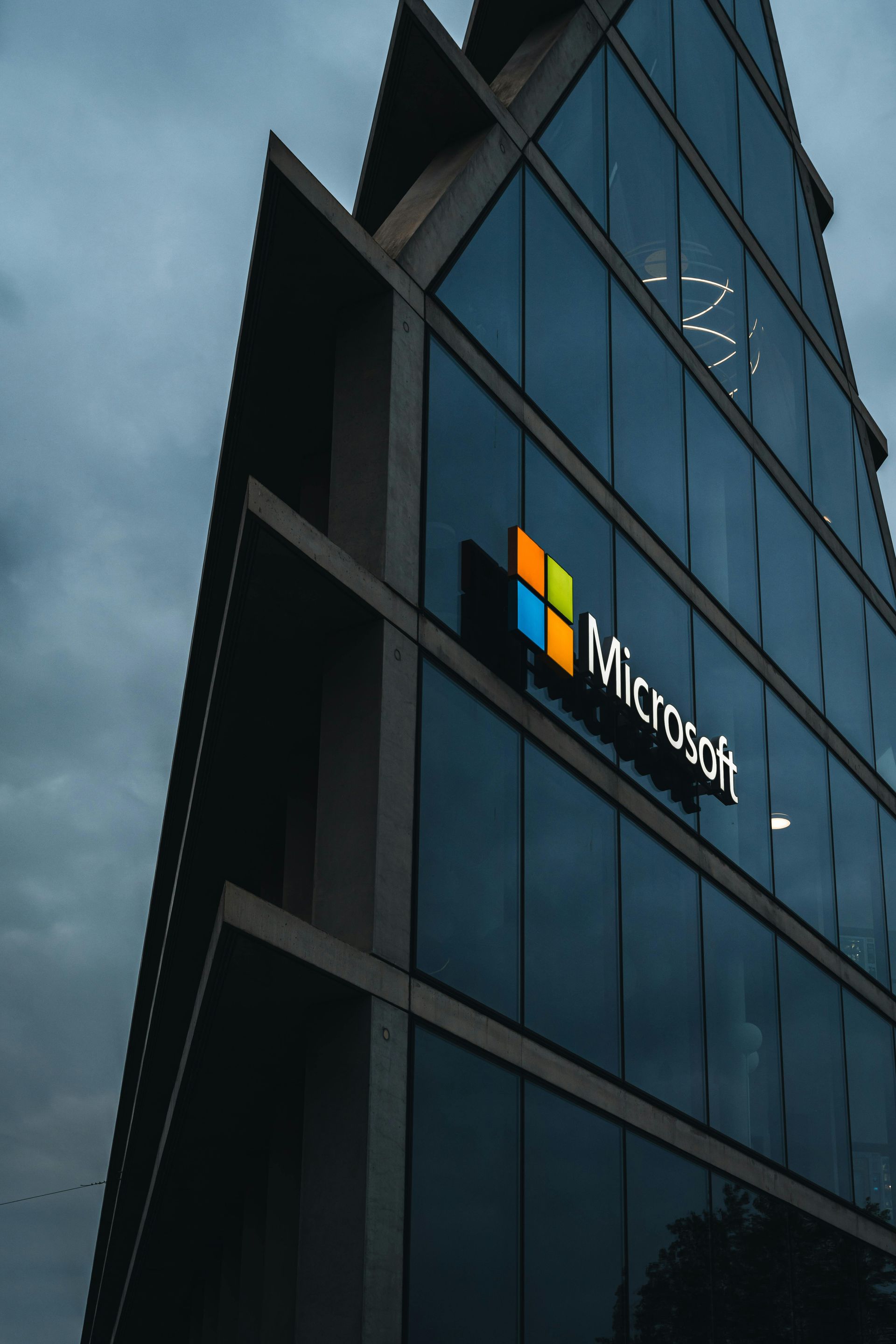 A tall building with a microsoft logo on it