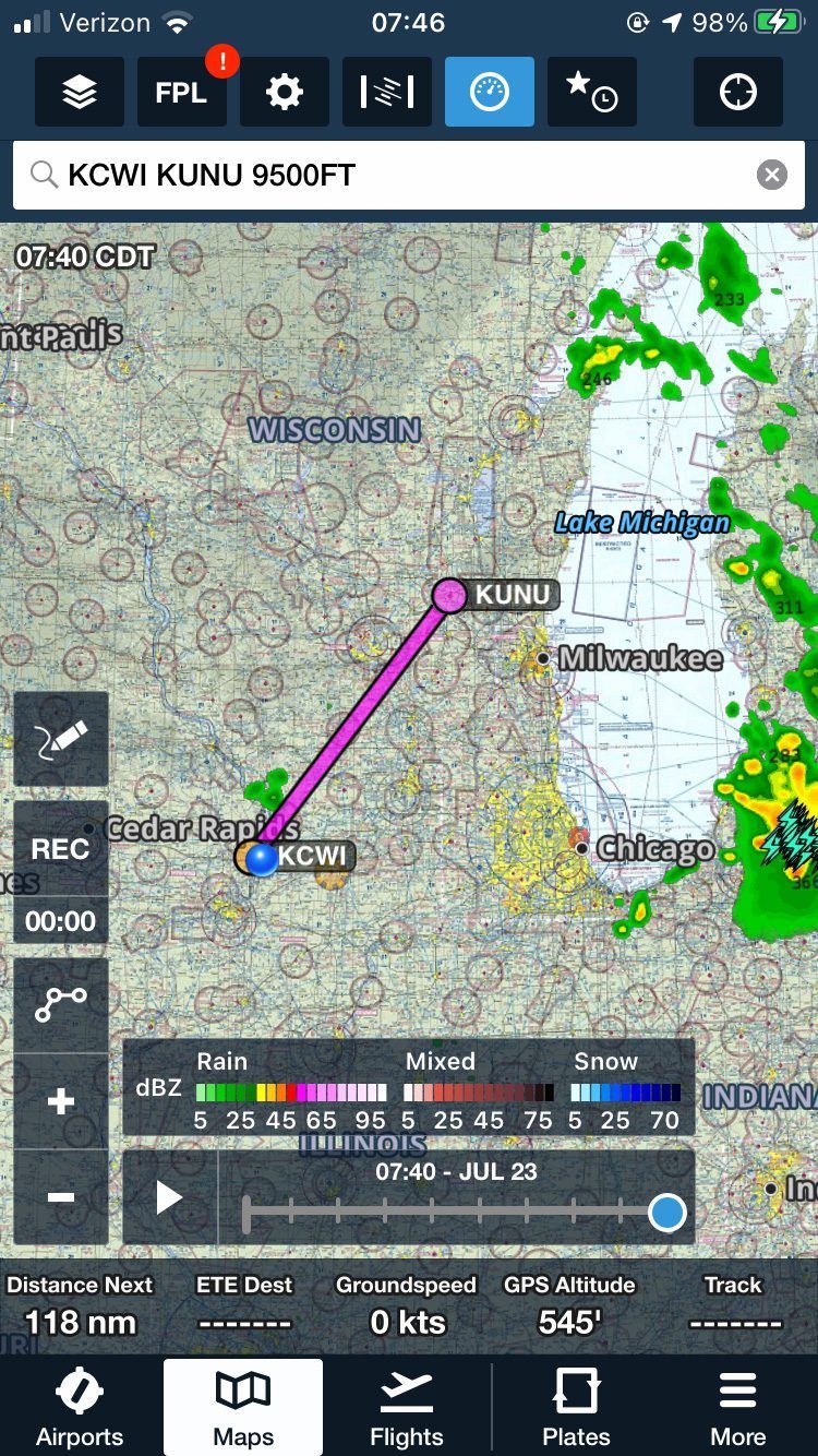 GPS map with a purple route line and location markers, showing weather radar overlays and navigation controls