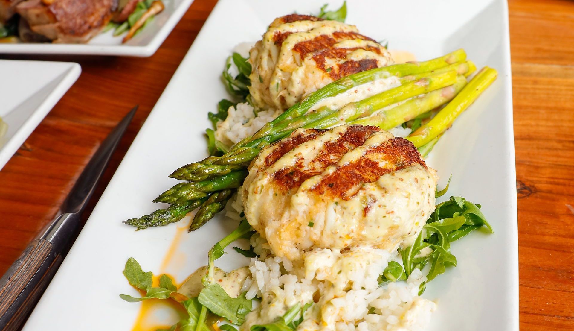 Crab cakes with grilled asparagus at the Mill Kitchen & Bar
