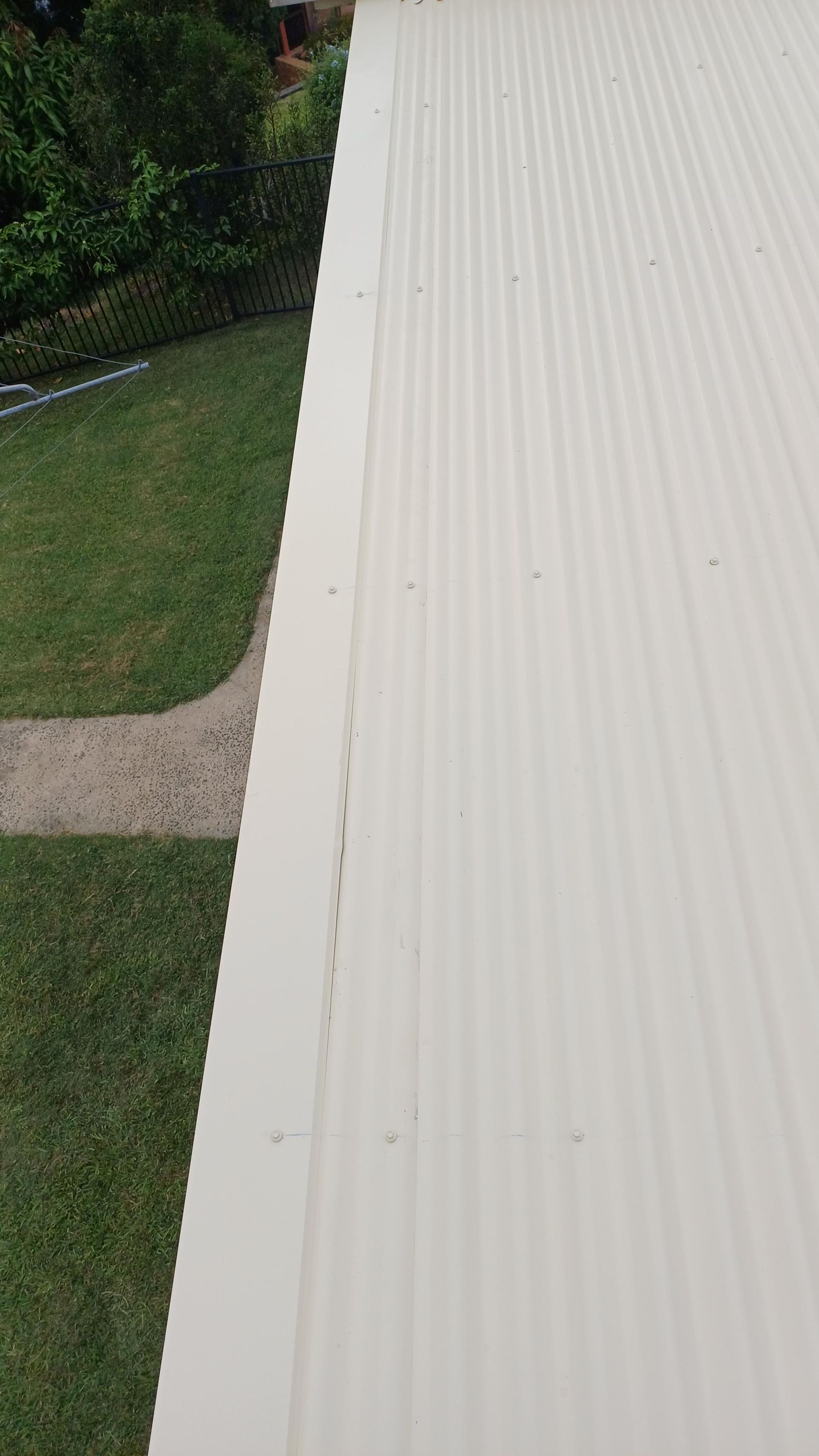 A White Metal Roof— Rooftech Roofing Services in Ocean Shores, NSW