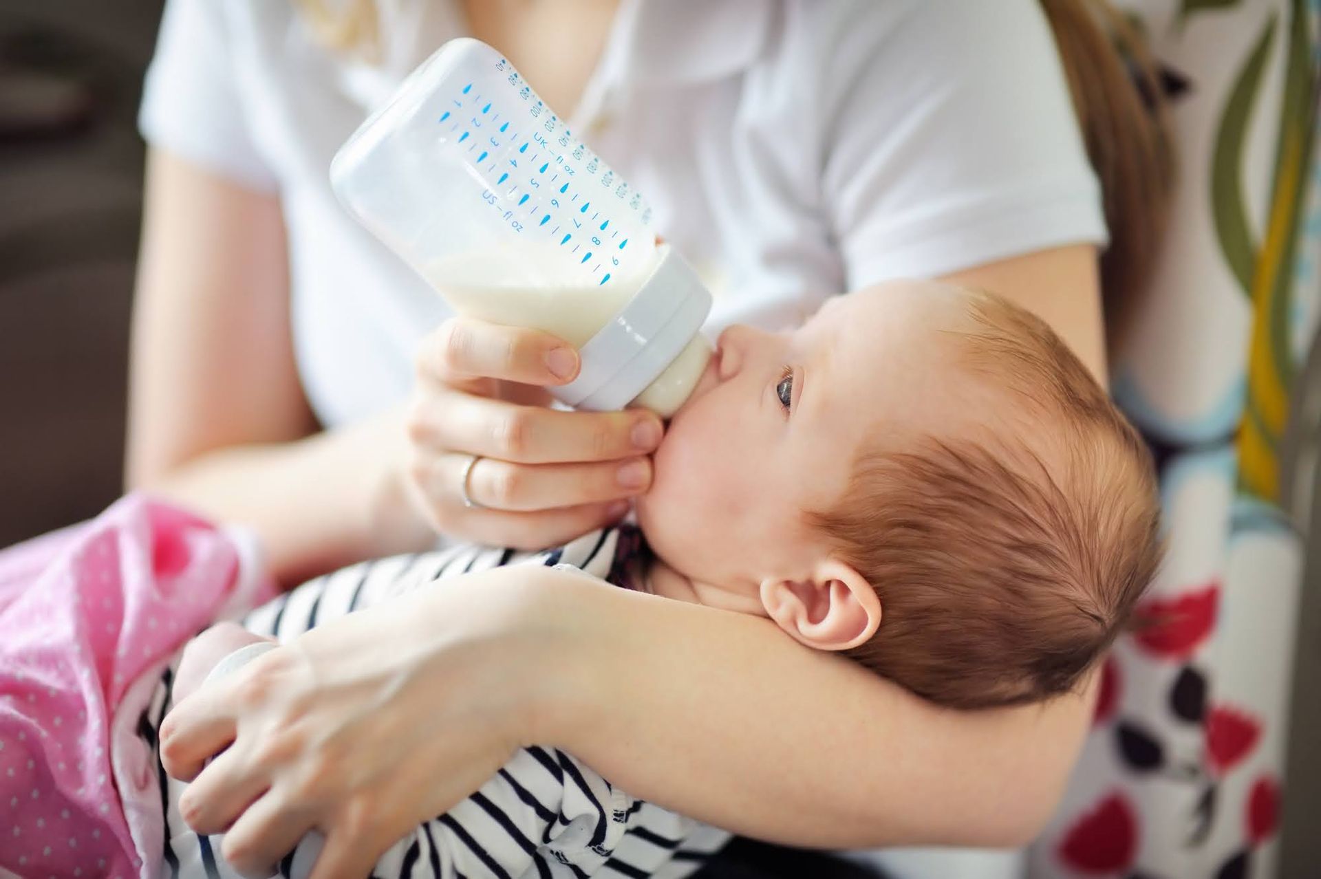 Baby being bottle-fed
