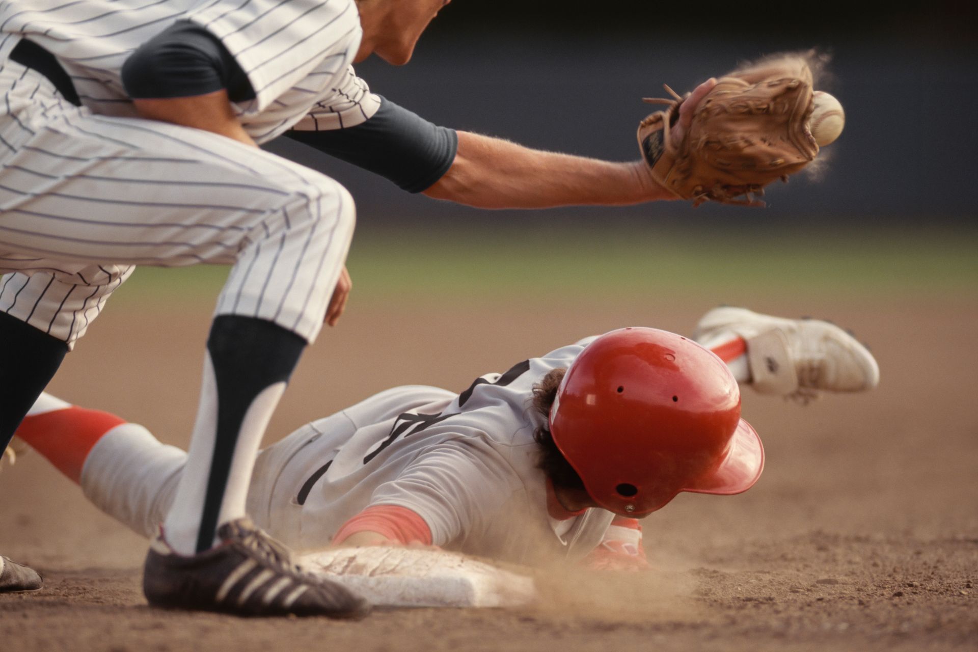 Baseball player sliding
