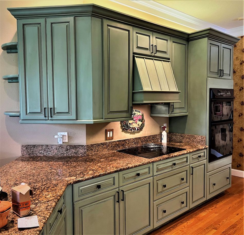 a box of baking soda sits on a counter in a kitchen
