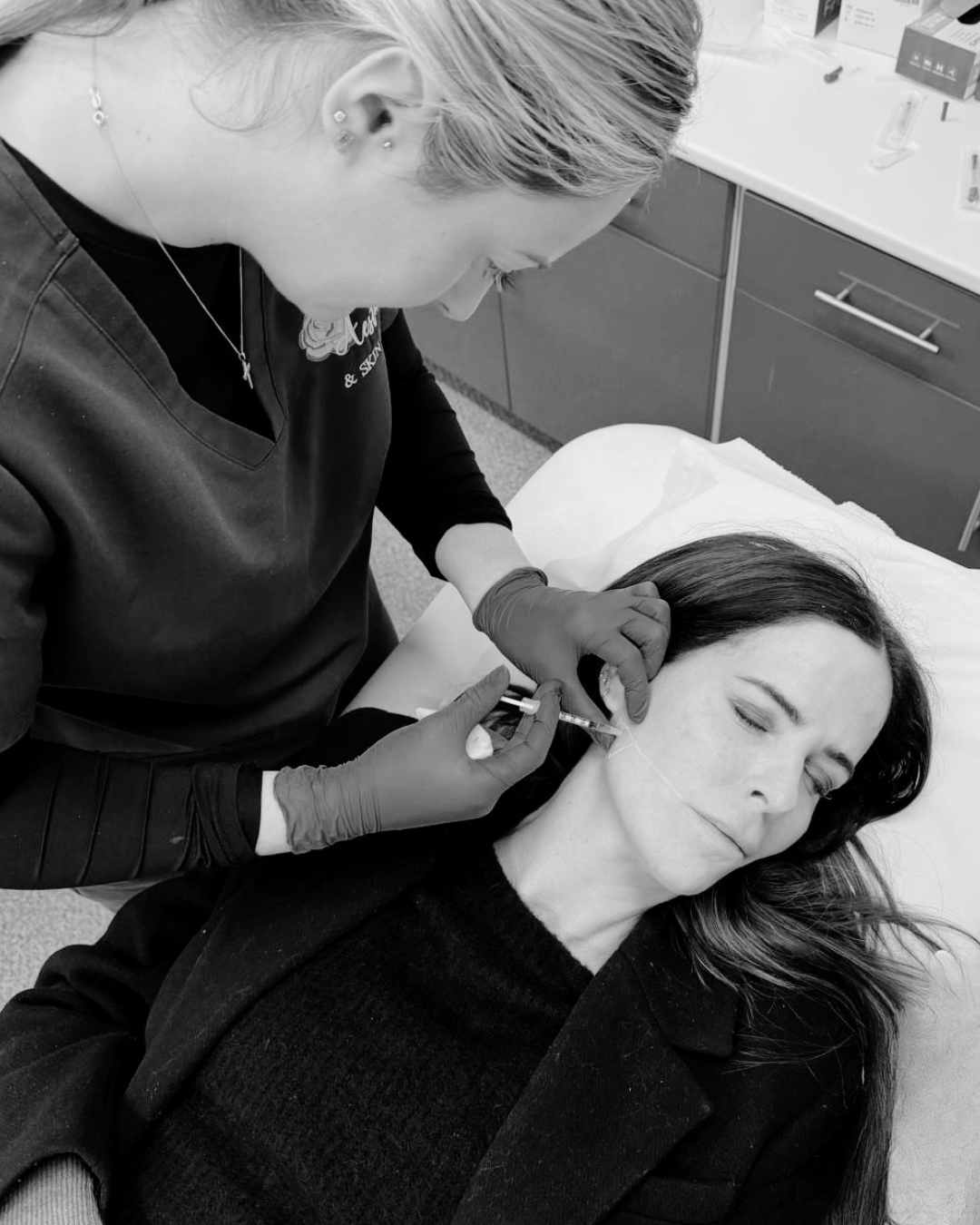 Rosie is treating a client with skin booster 