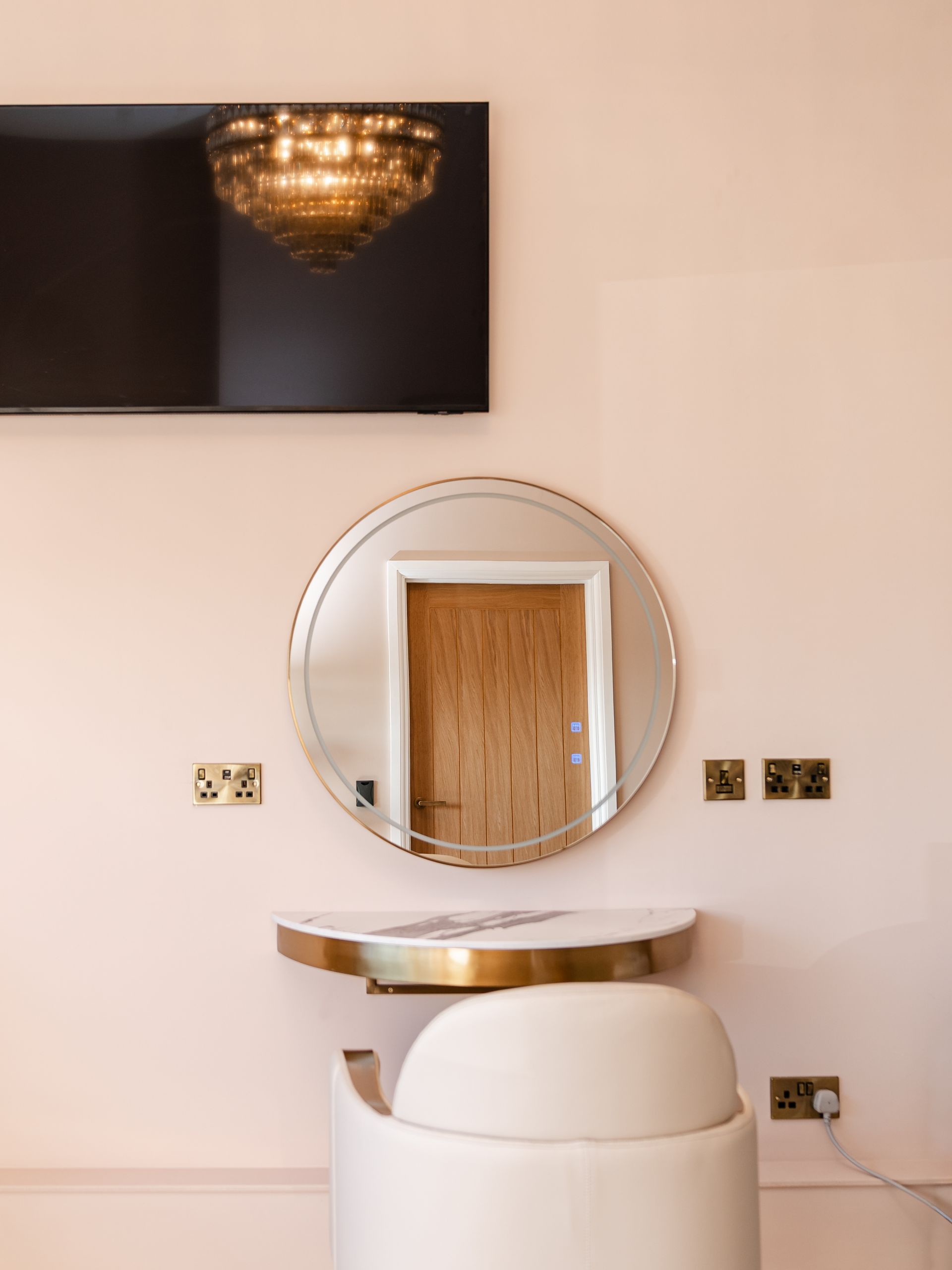 Mirror and chair in Norwich aesthetics clinic