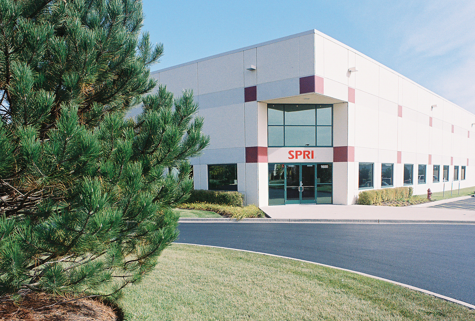 A large white building with the word spiri on it