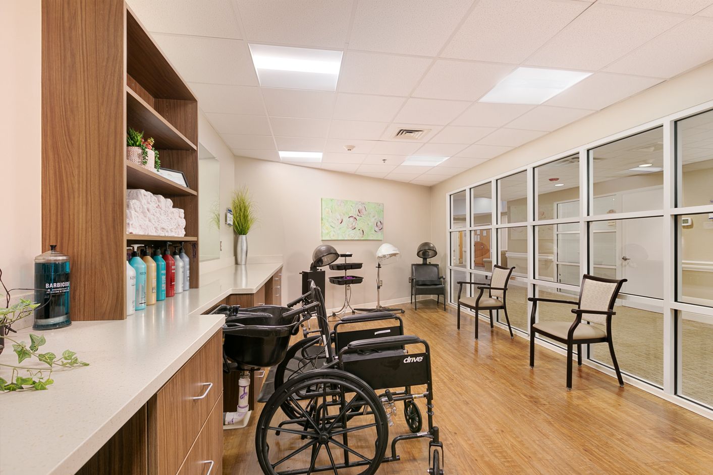 A wheelchair in a hair salon room.