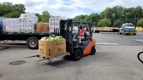 skid with a load of fruit to feed st marys
