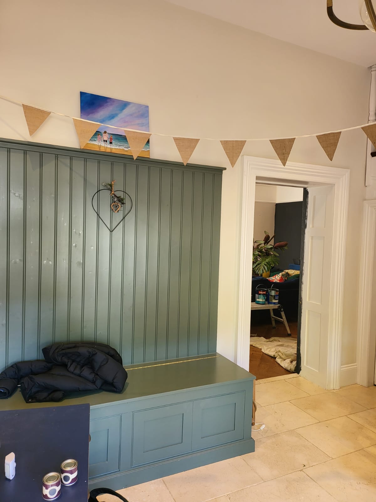 picture of a cabinet painted in sage green by painters and decorators Derby