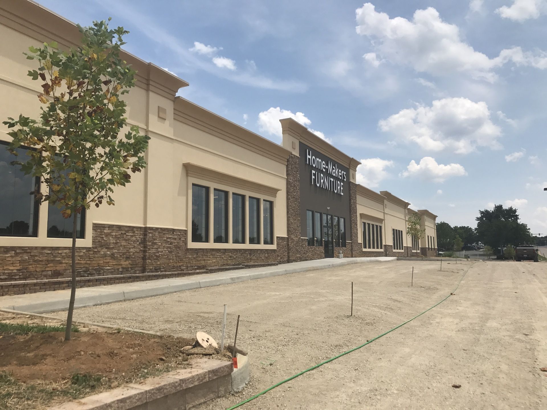 A large building with a lot of windows is being built.