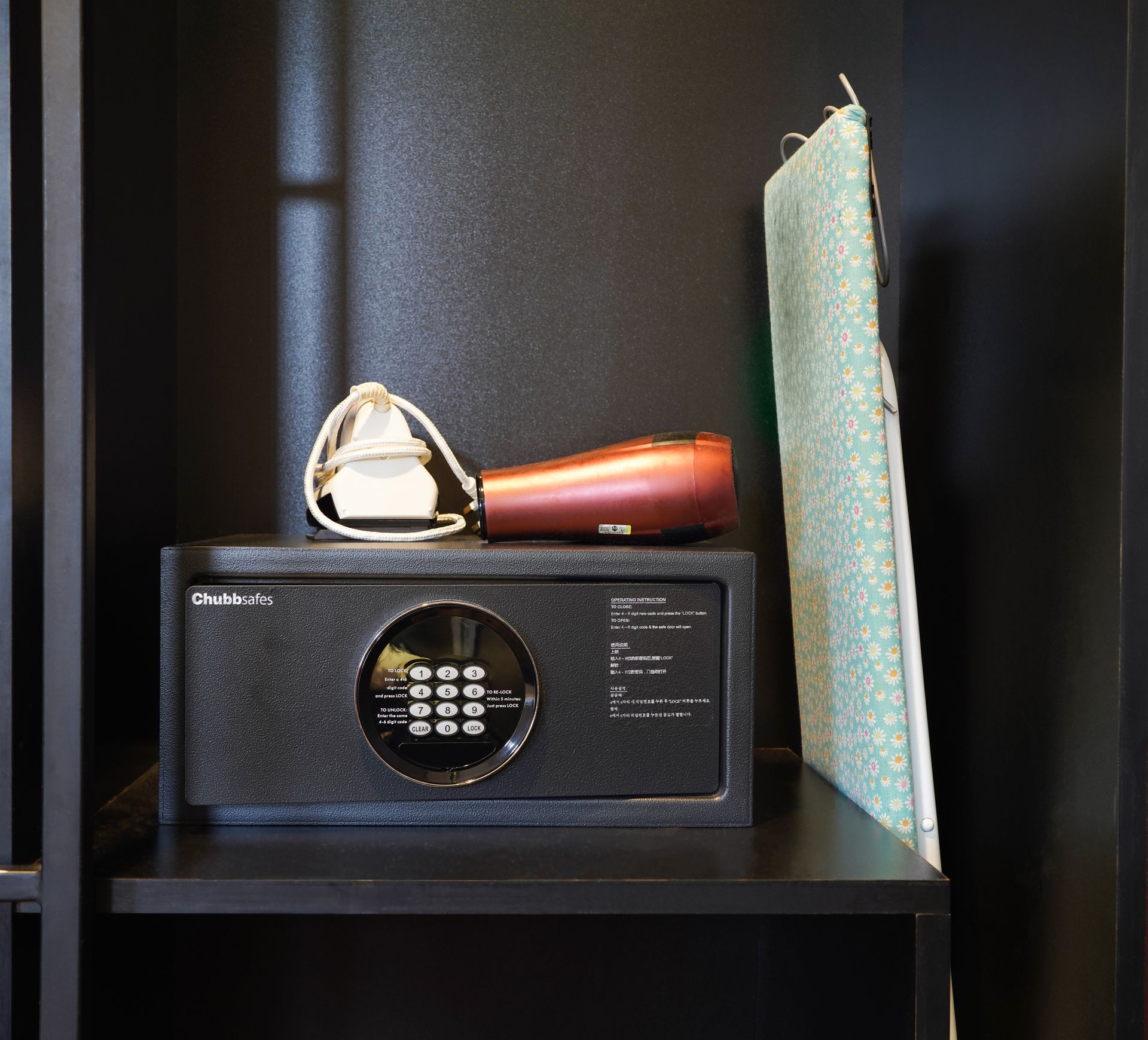 A safe with a hair dryer inside of it