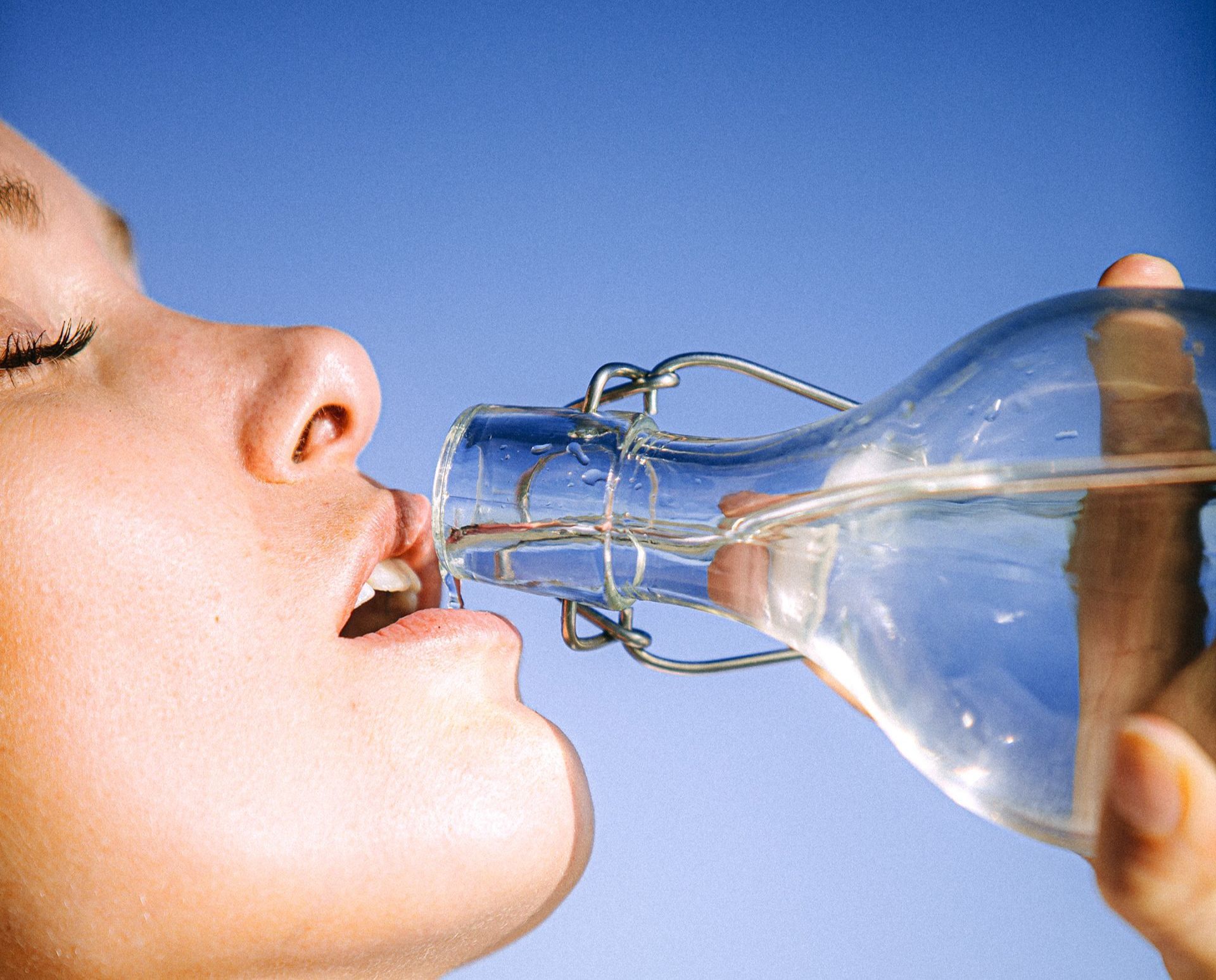 Woman drinking water from a bottle