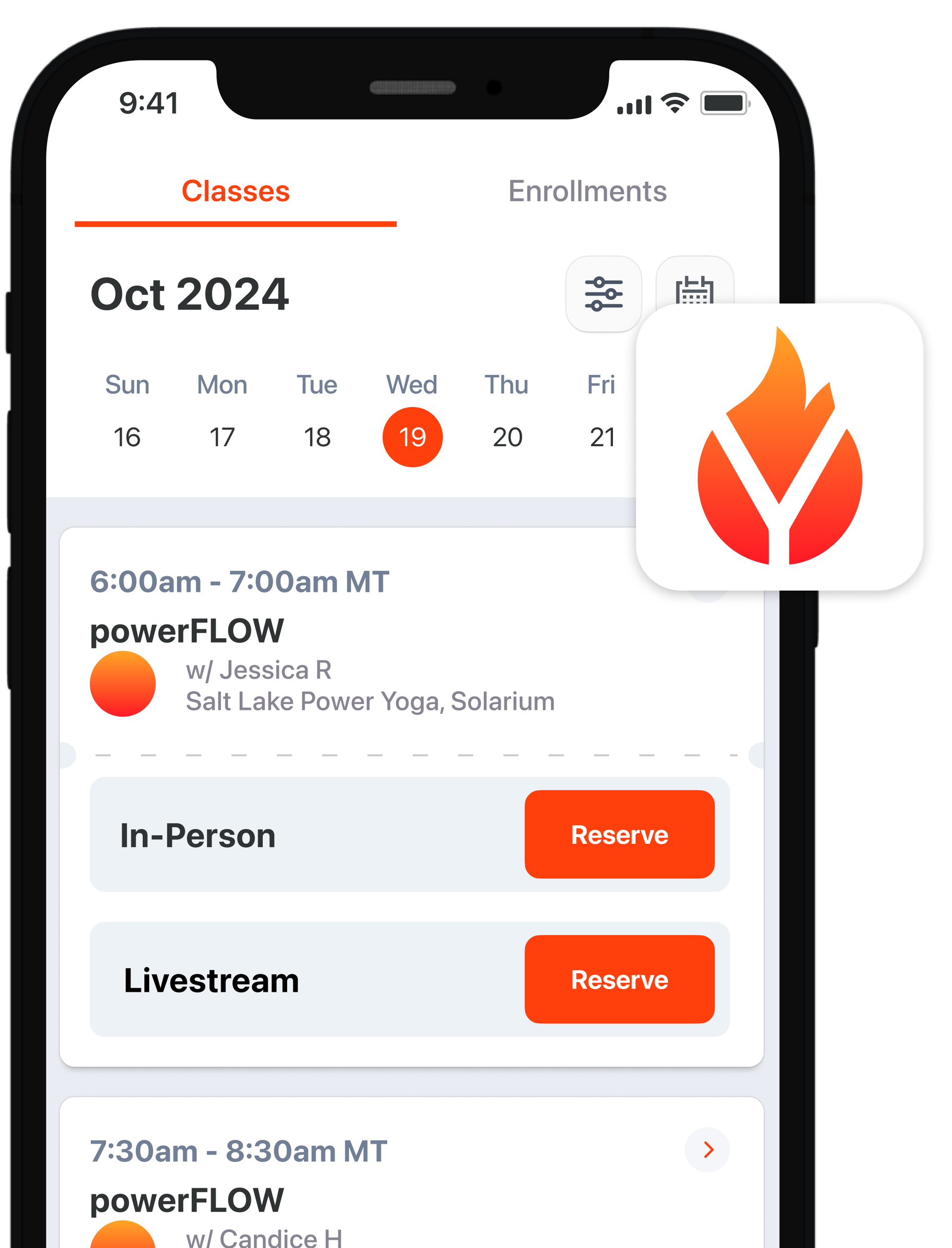 A cell phone displaying a calendar and the salt lake power yoga app
