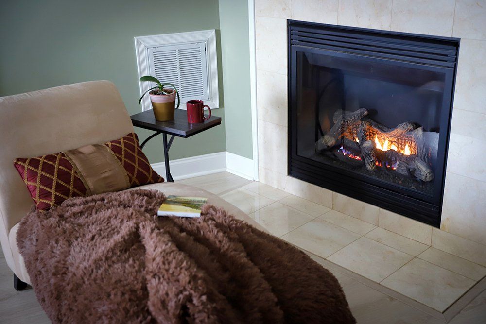 Fireplace And Sofa — Medford, OR — Gary Smith Custom Cabinet Shop Fireplace And Sofa — Medford, OR — Gary Smith Custom Cabinet Shop