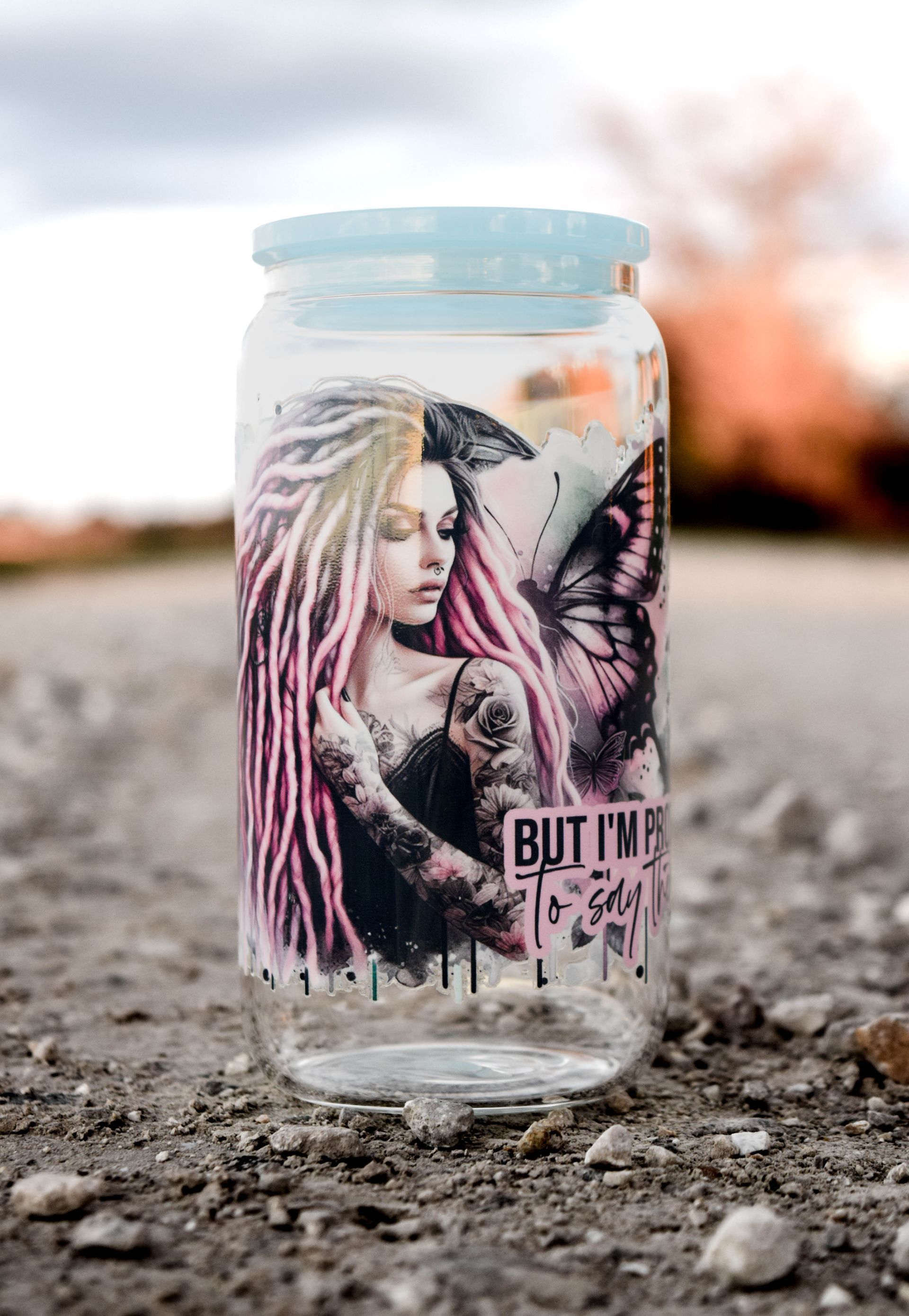 Jar with a fairy design, pink and black on glass, outdoors | Custom Bostic Creations