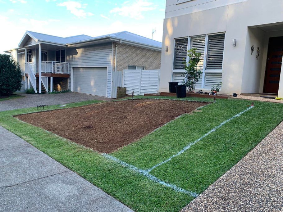 A House With a Lot of Grass in Front of It — Greener Gardens Gardening Service In Wauchope, NSW