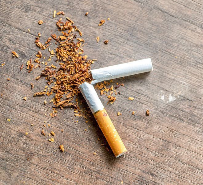 A Broken Cigarette on A Table — Mini Market Townsville Smoke Shop in Townsville City, QLD