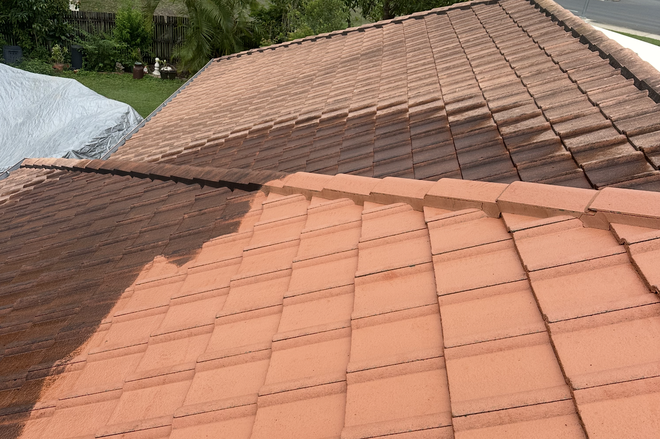 Red-tiled roof of a house, close-up view. Brown and red roof tiles with slight angle — Roof Tek CQ in Gracemere, QLD