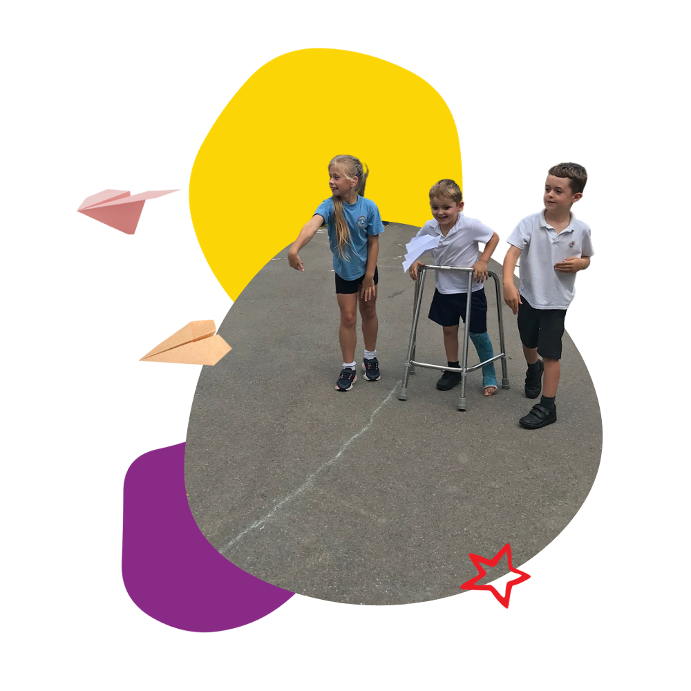 A boy with a cast on his leg is walking with two other children