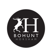 A black and white logo for bohunt horsham with a deer in a circle.
