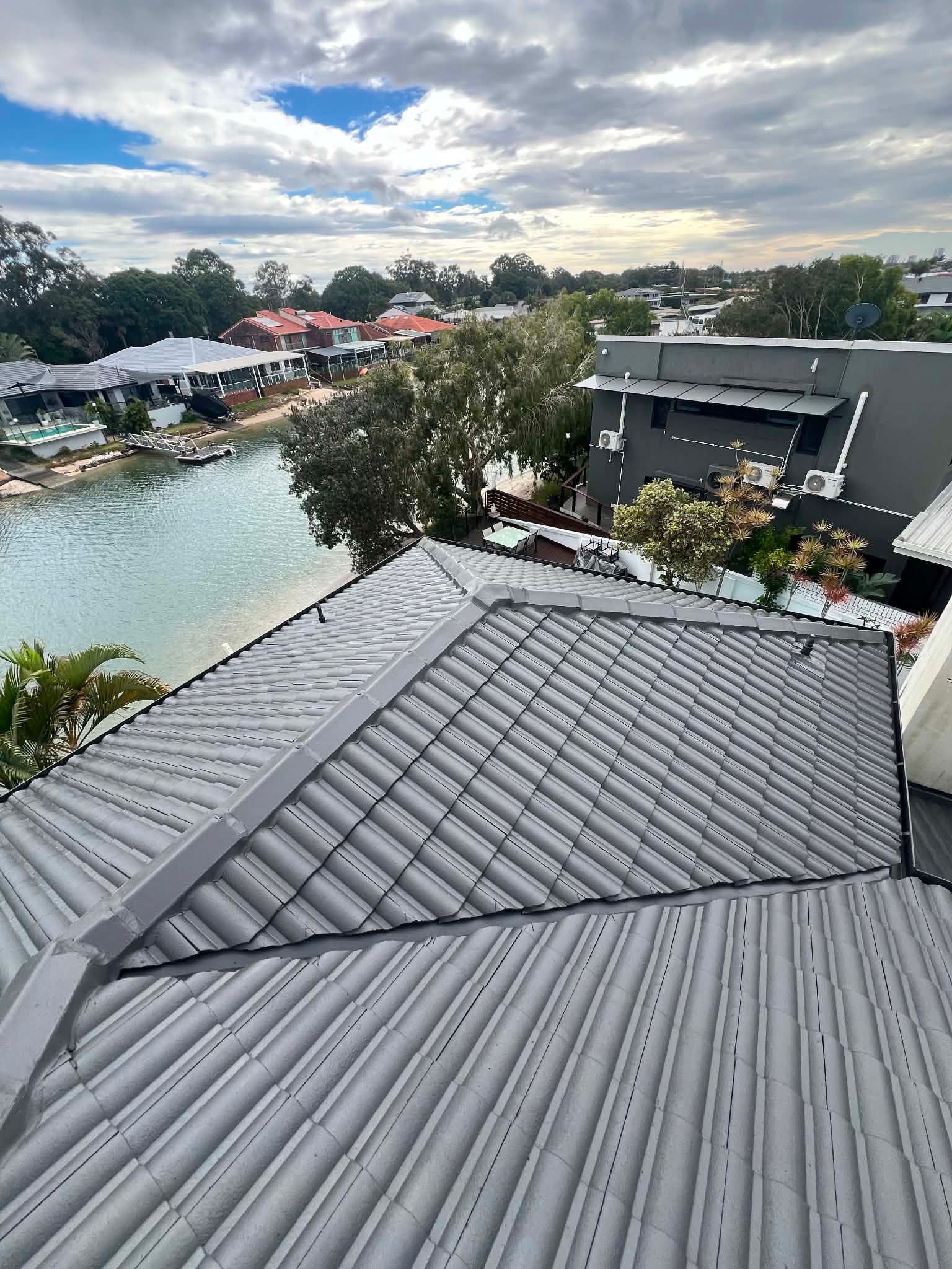 A roof recently painted grey in Robina