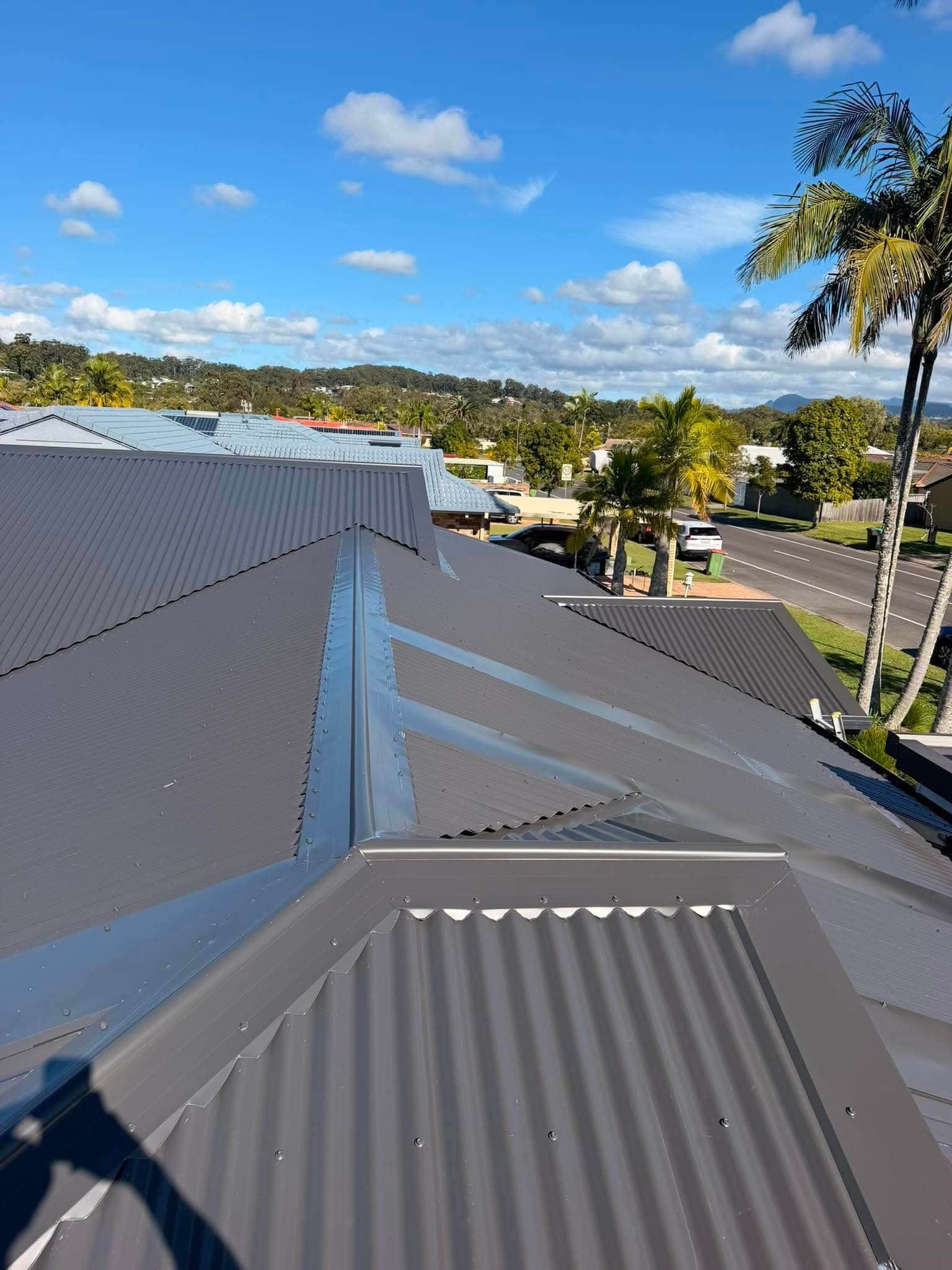 A drone shot of a roof being restored in Robina