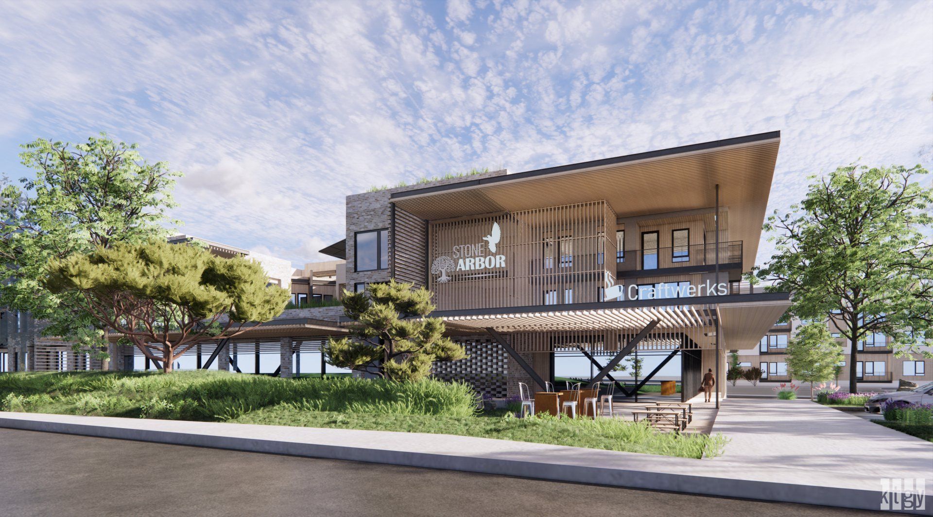 Exterior image with a lot of windows and trees in front of it.